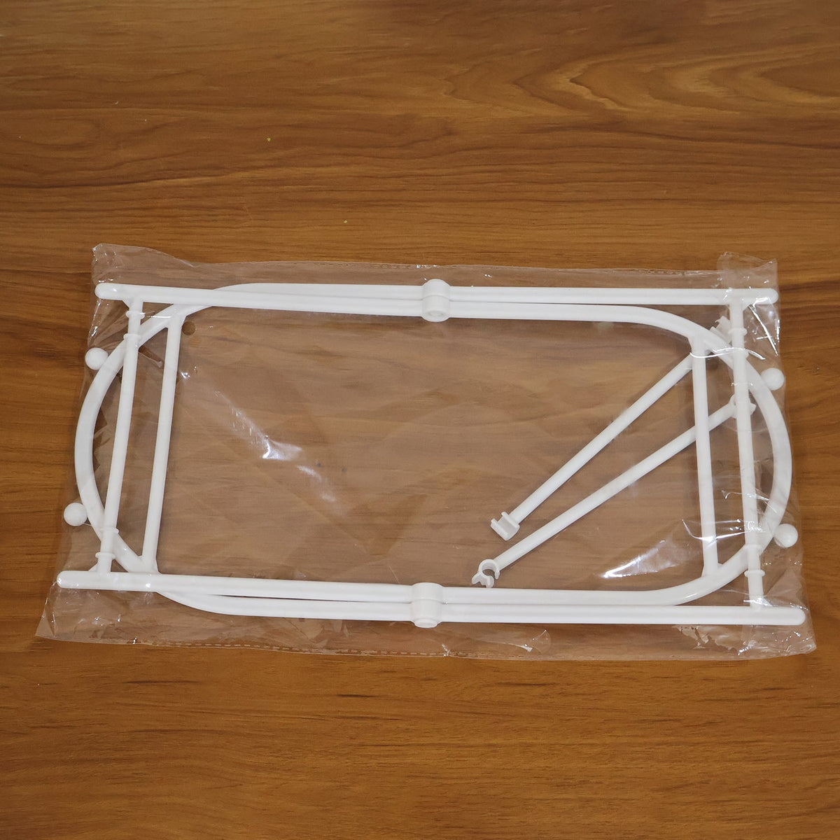 Compact trash bag holder stand folded, perfect for space saving