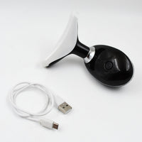 The portable Neck Face Massager shown with its USB charging cable.