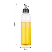 Hand pouring oil from the 1 litre transparent plastic oil dispenser with precise control.
