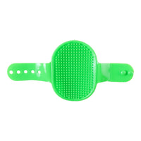Pet cleaning brush featuring ergonomic grip and adjustable strap