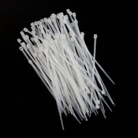 Bundle of 3x100mm heavy-duty black nylon cable ties, ready for use.
