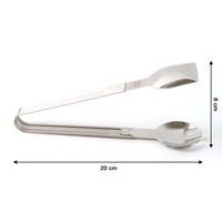 Salad being served with stainless steel multipurpose serving tong
