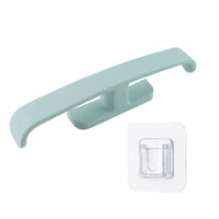 Detail view of the sleek, minimalist design of the adhesive bathroom storage solution.