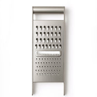 Quick prep stainless steel grater and slicer with sharp blades