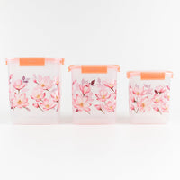 Stackable floral food storage container set with transparent bodies.