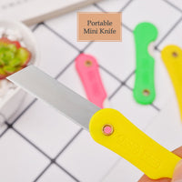 Arrangement of the 12-pack multicolour mini paper cutter knives, highlighting variety.
