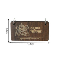 Close-up showing detailed engraving on Hanuman Chalisa wooden prayer book