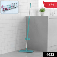 Close-up of flat floor mop's slim rectangular head cleaning tight corners