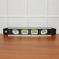 Precision aluminum spirit level with clear markings on bubble vials for alignment