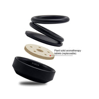Elegant car air freshener with a unique double-ring design for effective diffusion.