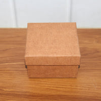 Small jewellery display and storage box with soft cushion