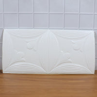 Textured white floral 3D foam wallpaper panel enhancing home interior aesthetics