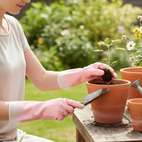 Set of garden hand tools including pruning shears and cultivator