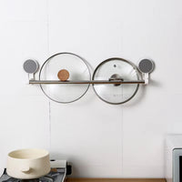 Detail of self-adhesive towel rack showing strong mounting surface