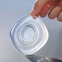 Nano gel pad securely holding a mobile phone on a car dashboard.