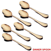 Close-up of the elegant gold dinner spoon and fork.