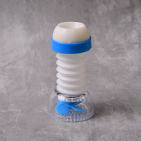 Kitchen sink tap water filter with impurity trap and splash guard