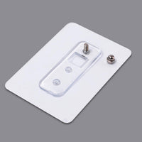 Reusable plastic wall hook with adhesive mounting