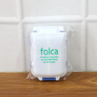 Blue portable pill organizer with secure lids