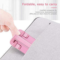 Compact phone stand with mirror, providing a convenient solution for desk organization.