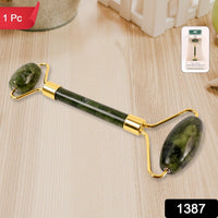 Close-up of dual jade stone face roller for skincare