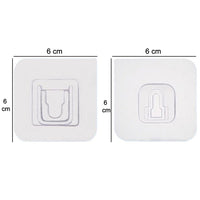 A robust heavy-duty adhesive hook in use, holding multiple items securely.