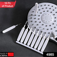 A reusable shower nozzle cleaning brush demonstrating its flexible nylon spiral head.