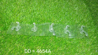 Multiple transparent wall hooks organized on a smooth surface, ready to hold various items.