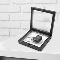 Close up of stainless steel nail clipper keychain ideal for travel grooming