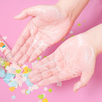 Portable test tube bottle filled with flower-shaped paper soap strips