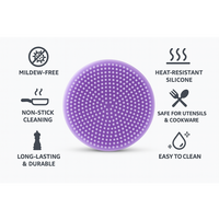Silicone dish scrubber gently cleaning a delicate glass without scratches.