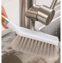 Diagram illustrating the ergonomic design and natural material components of the cleaning brush.