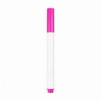 Close-up of fine tip of assorted colour marker pen for precision work.