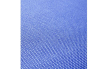 Eco-friendly Yoga Mat unrolled on a wooden floor.