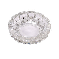 Versatile glass ashtray with multiple slots, suitable for both cigars and cigarettes.