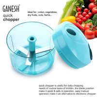 Close-up of the sharp steel blades inside the Ganesh 725ml chopper.