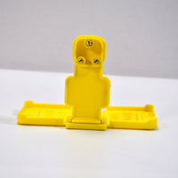 Back view of the PHOBIA yellow mobile charging wall holder, ready for installation.