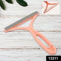 Compact double-sided lint brush, ideal for travel and quick clean-ups.