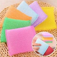 Scratch proof kitchen scrubber pads in a stack, ready for use on delicate surfaces.