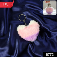 Heart shaped plush keychain attached securely to bag zipper