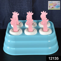 Giraffe ice molds filled with popsicle mixture ready for freezing