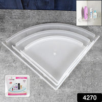 Wall-mounted plastic corner shelf holding shampoo and bath products.