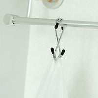Set of 5 stainless steel S-hooks for home organization.