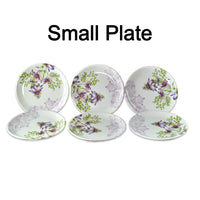 Complete 32-piece plastic dinner set, showcasing various plates and utensils.