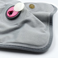Detailed view of the electric heating pad's soft cloth material for soothing warmth.