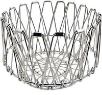 Multipurpose stainless steel wire basket transformed into a stylish fruit bowl for dining.