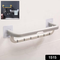 Double bar towel rack neatly holding bath towels and a hand towel.