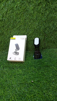Packaging of the magnetic car phone holder, highlighting key features.