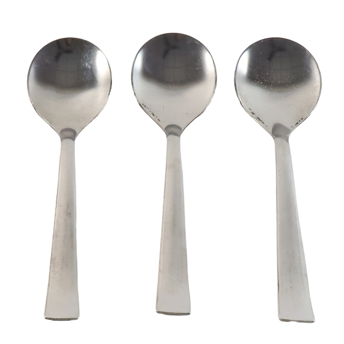 Close view of rust-resistant stainless steel spoons from the set