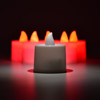 LED tea lights casting a soft red glow, ideal for home decoration.